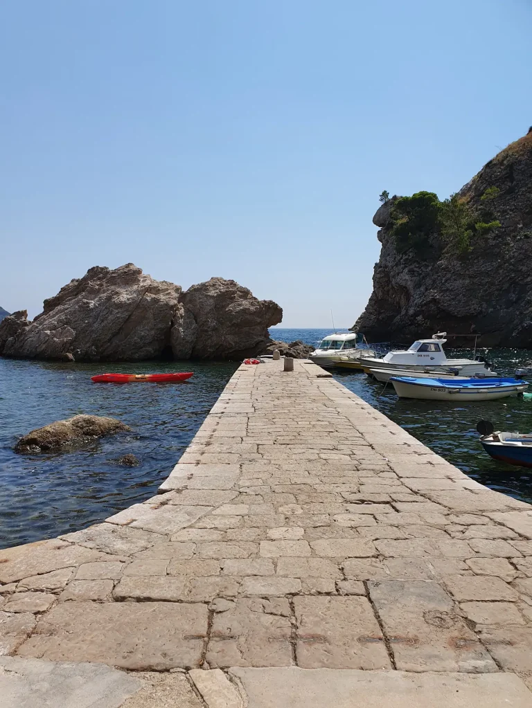 Stone jetty and small boats at Pile Bay below Dubrovnik, Blackwater Bay in Game of Thrones
